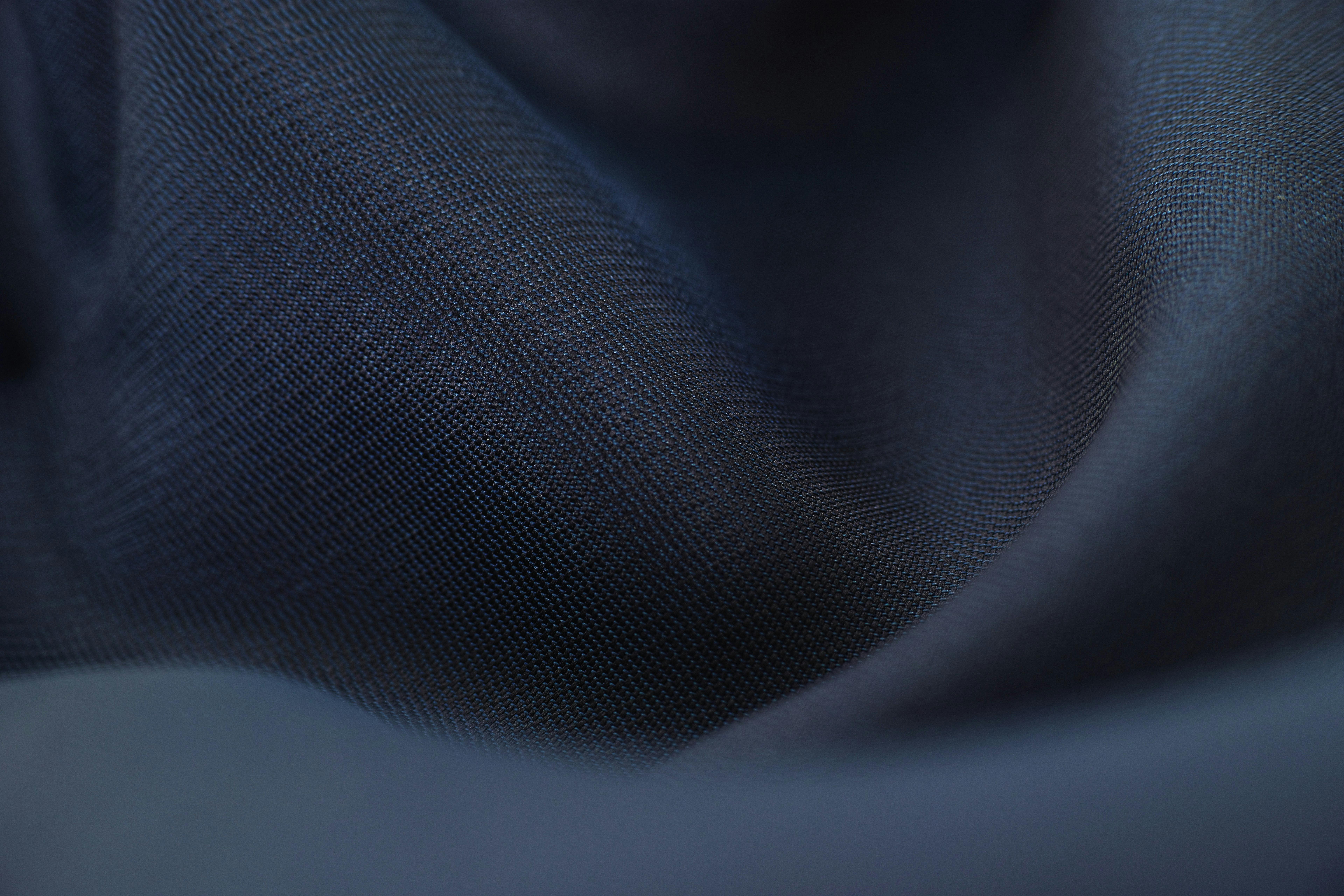 pexels-photo-459486-459486 Detailed close-up of woven blue fabric with elegant crumples, highlighting texture and depth.